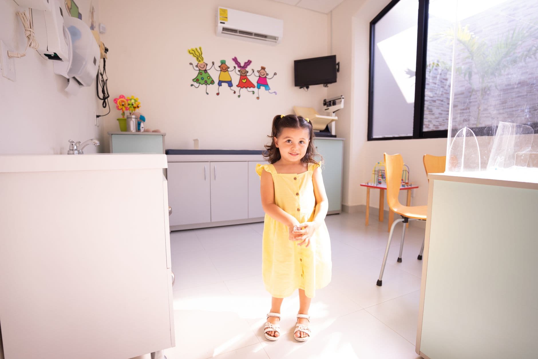 A bright, colorful pediatric therapy playroom