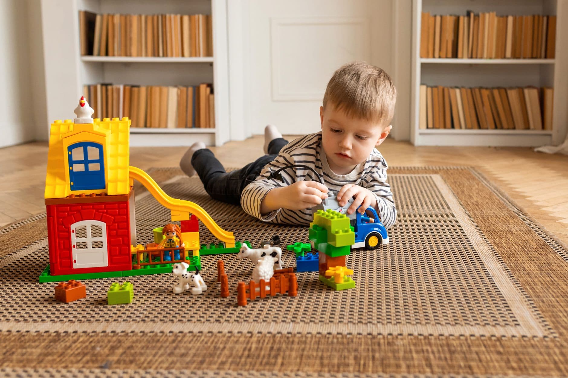 A young child in a play therapy session at home