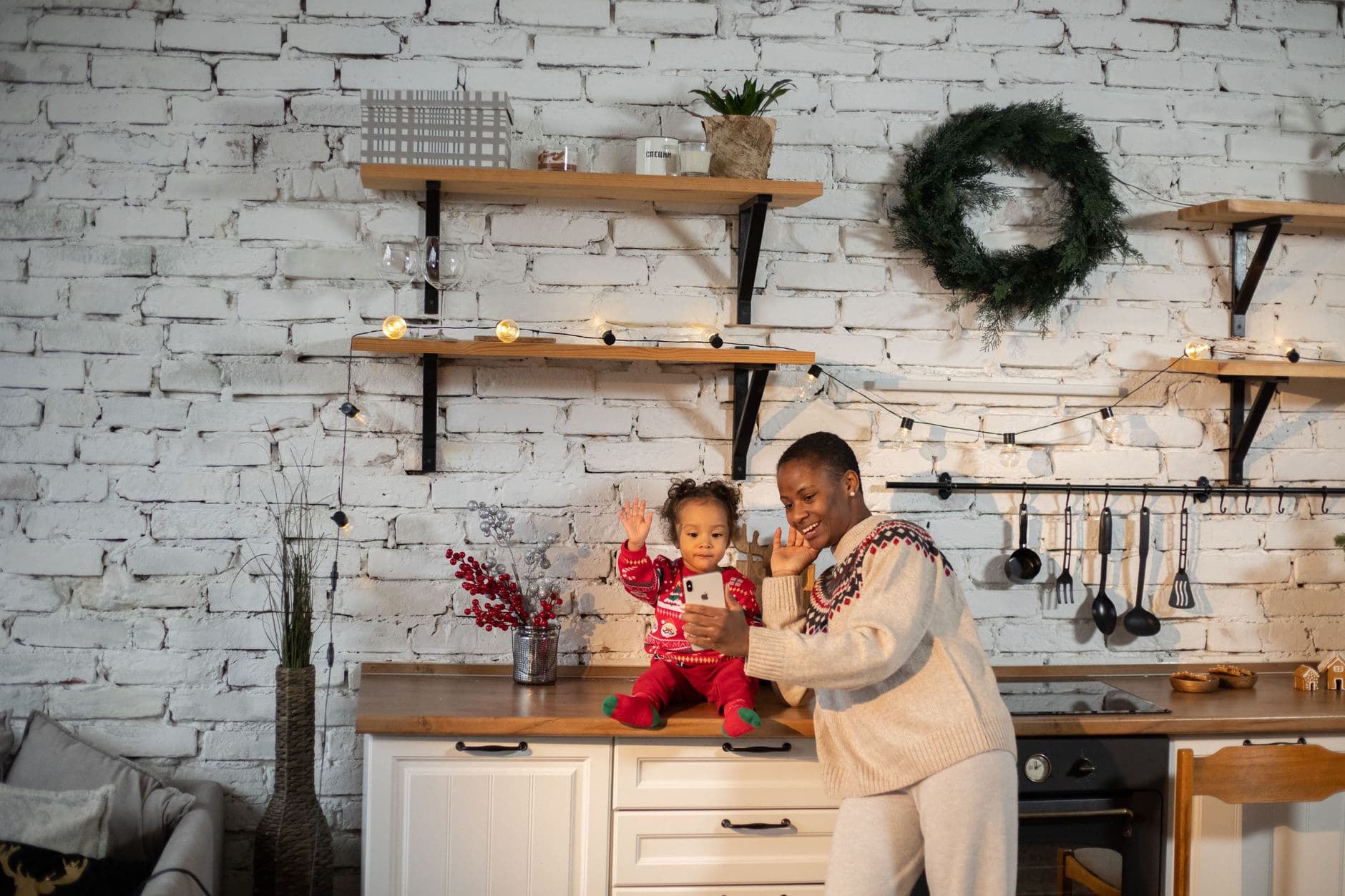 A parent making a phone call at home