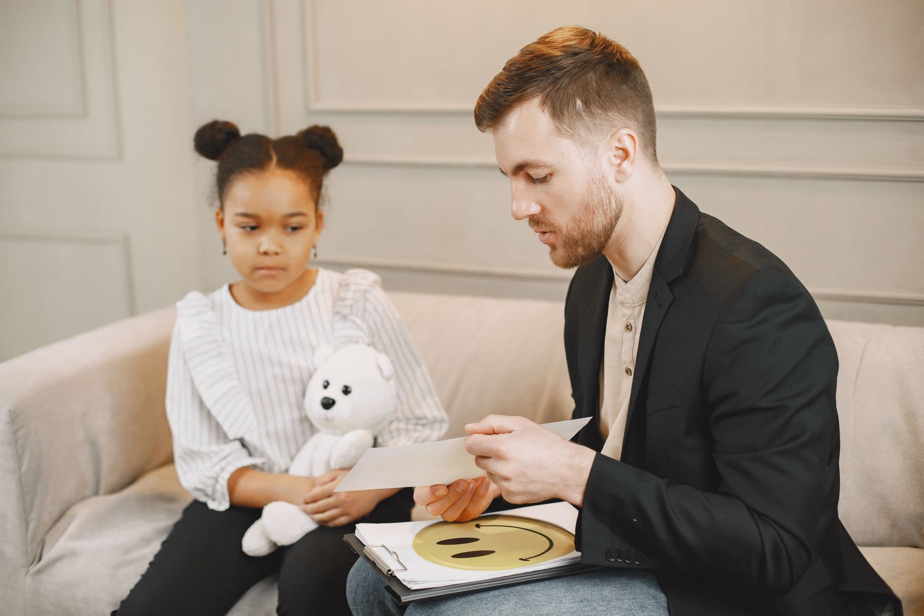 A speech-language pathologist working with a young child