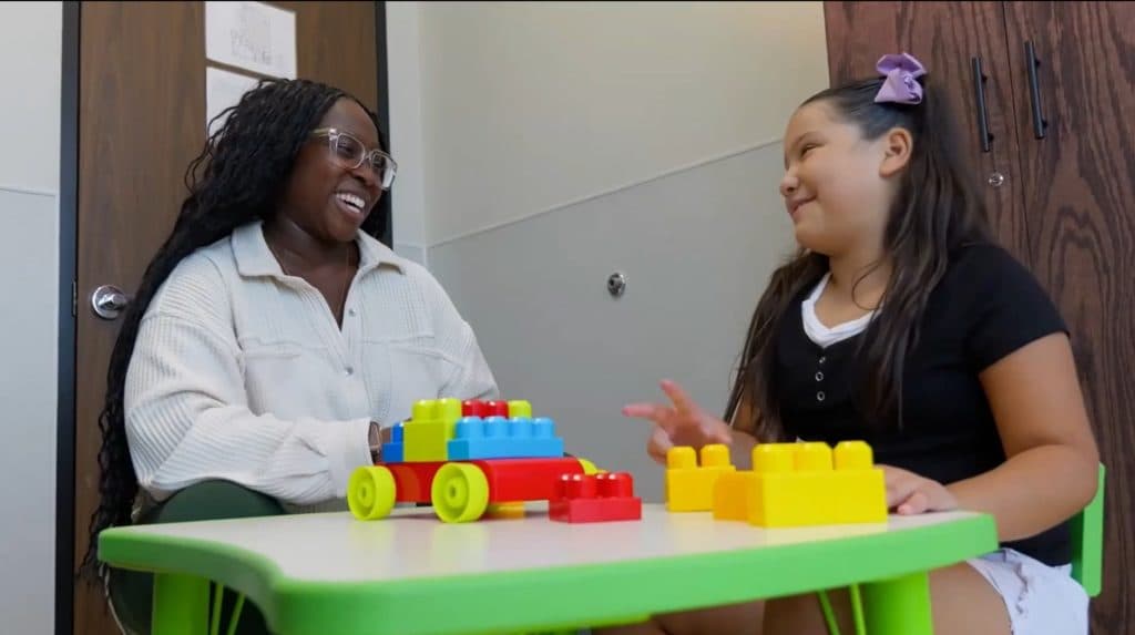 Cole Pediatric Therapy speech therapist engages in treatment with young patient