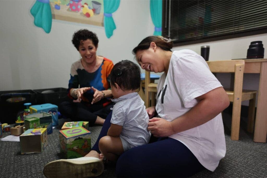 A child with hearing loss improving his language skills with auditory verbal therapy at Bliss Speech and Hearing Services