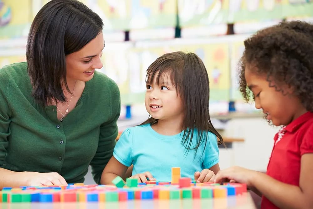 Child learning with therapist at PediaPlex