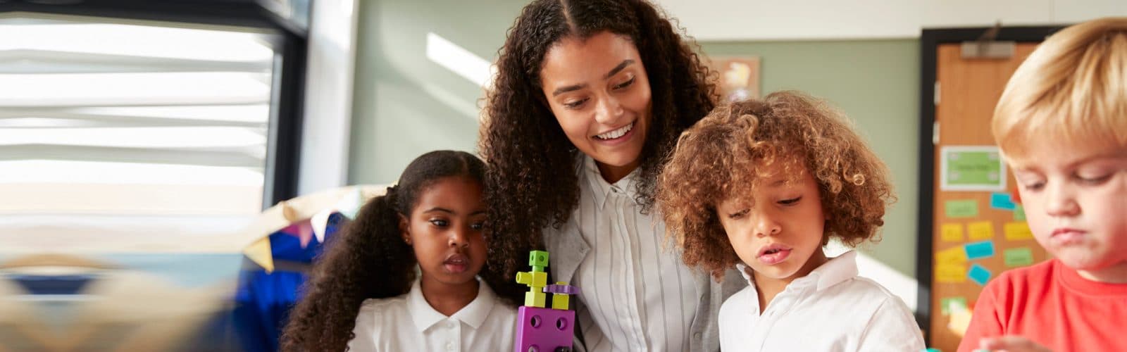 Teacher and kids playing