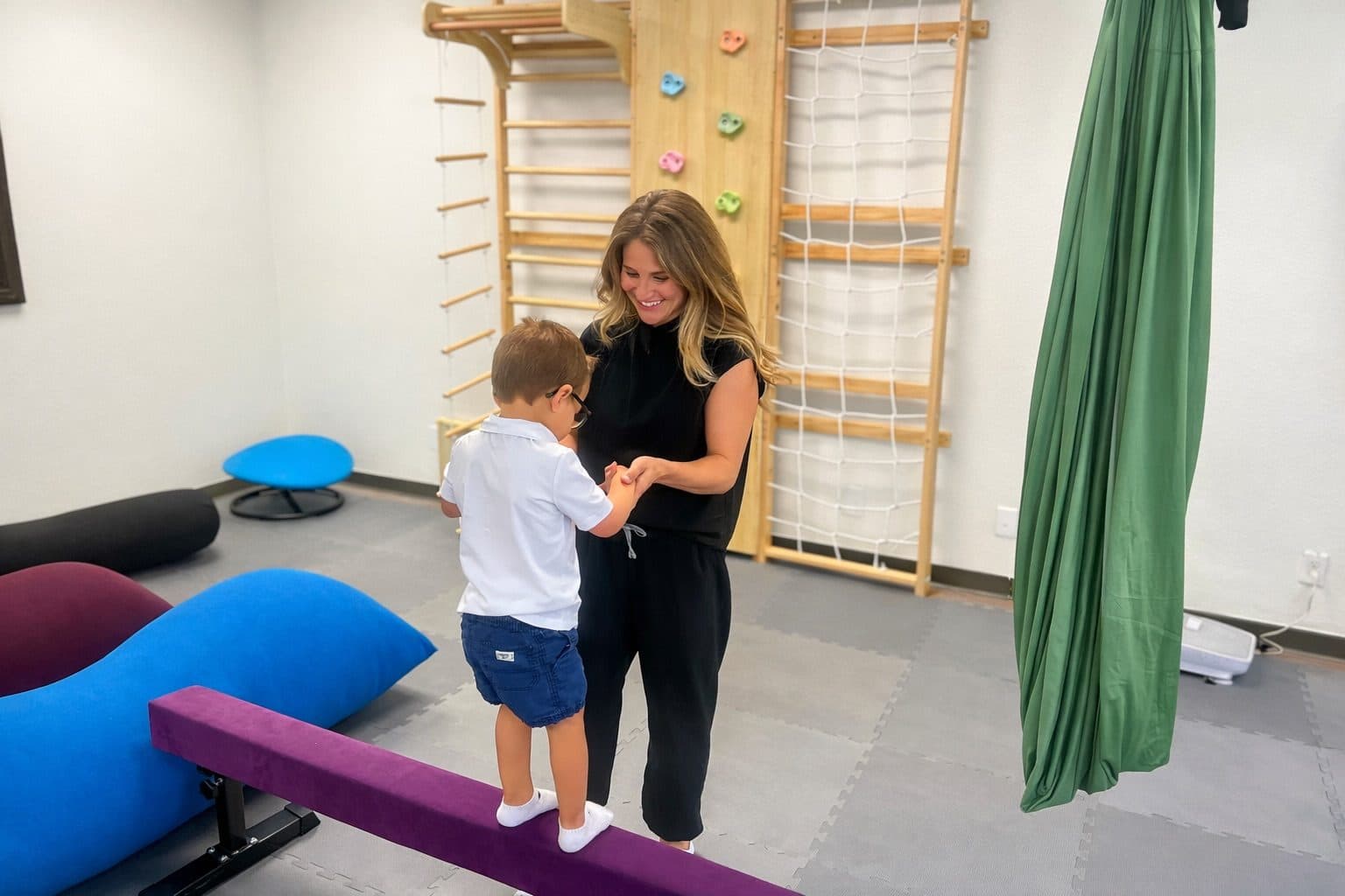 NeuroNest therapy gym with specialized equipment