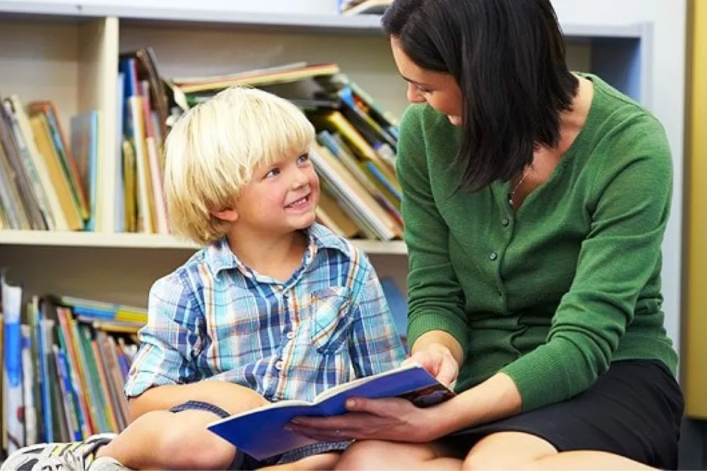 PediaPlex - Child learning to read with therapist