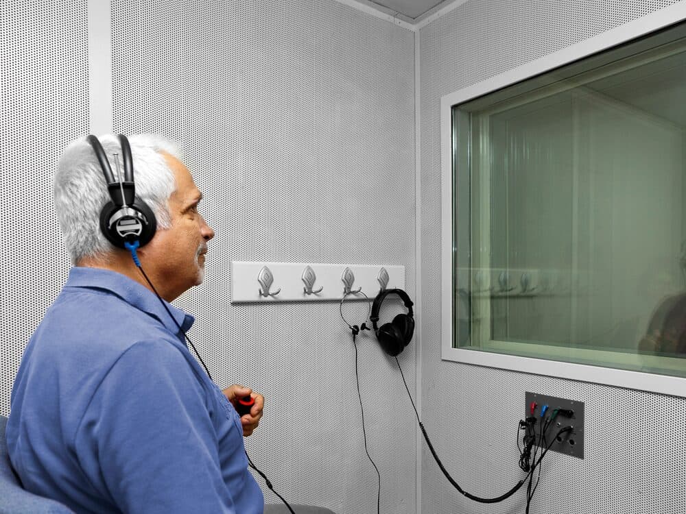 Audiologist conducting a comprehensive hearing evaluation at Autumn Oak in Friendswood, TX