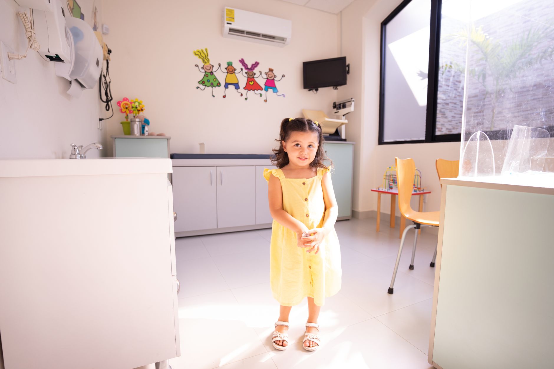 A bright, colorful pediatric therapy playroom