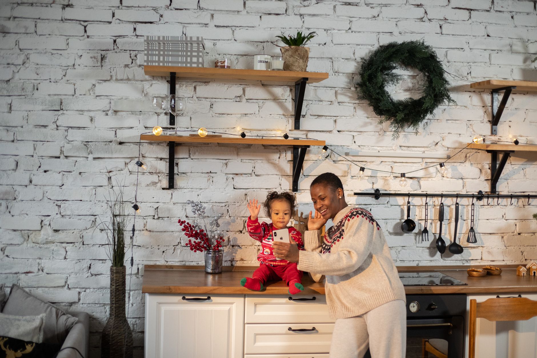 A parent making a phone call at home